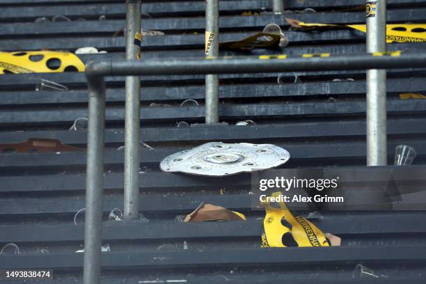 Model Bundesliga Meisterschale trophy is seen on the ground as Borussia Dortmund finish second behind FC Bayern Munich after the draw during the...