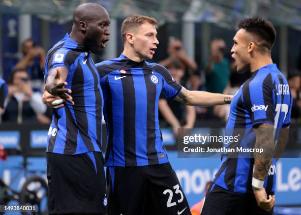 Romelu Lukaku of FC Internazionale celebrates with teammates Nicolo Barella and Lautaro Martinez after scoring the 1-0 during the Serie A match...
