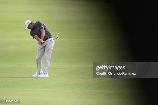 Retief Goosen of South Africa plays a shot on the second hole during the third round of the KitchenAid Senior PGA Championship at Fields Ranch East...