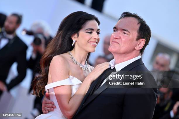 Daniella Pick and Quentin Tarantino attend the "Elemental" screening and closing ceremony red carpet during the 76th annual Cannes film festival at...