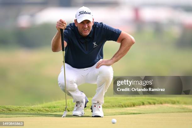 Robert Karlsson of Sweden lines up a putt on the second green during the third round of the KitchenAid Senior PGA Championship at Fields Ranch East...