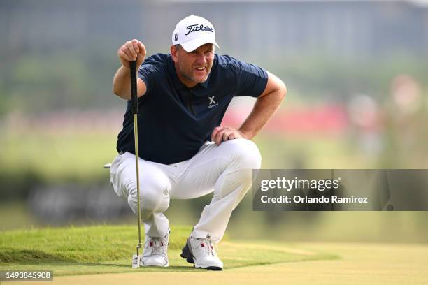 Robert Karlsson of Sweden lines up a putt on the second green during the third round of the KitchenAid Senior PGA Championship at Fields Ranch East...