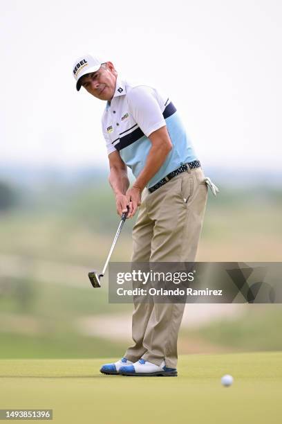 Adilson da Silva of Brazil putts on the second green during the third round of the KitchenAid Senior PGA Championship at Fields Ranch East at PGA...