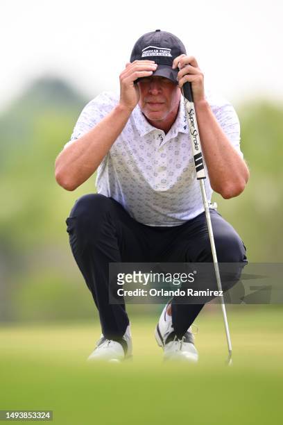 Steve Stricker lines up a putt on the second green during the third round of the KitchenAid Senior PGA Championship at Fields Ranch East at PGA...