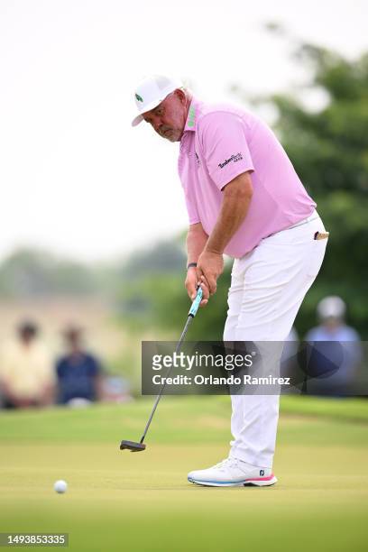 Darren Clarke of Northern Ireland putts on the second green during the third round of the KitchenAid Senior PGA Championship at Fields Ranch East at...