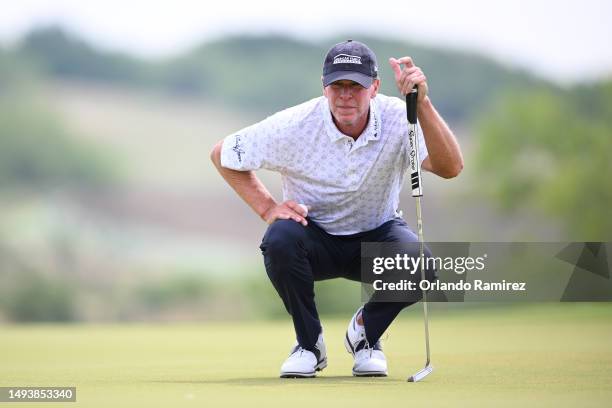 Steve Stricker lines up a putt on the second green during the third round of the KitchenAid Senior PGA Championship at Fields Ranch East at PGA...