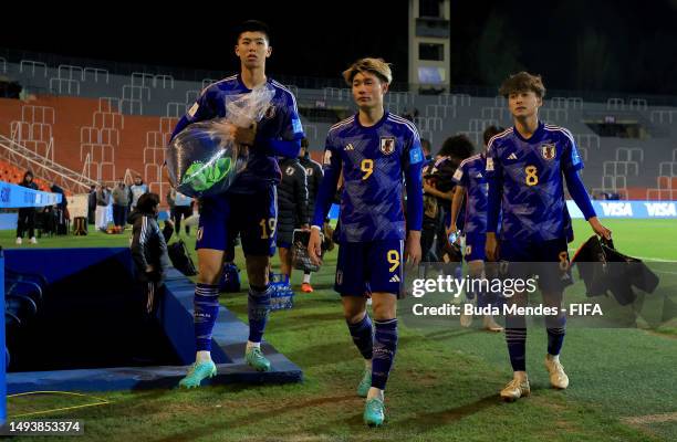 Kota Takai, Shio Fukuda and Kodai Sano of Japan look dejected after a FIFA U-20 World Cup Argentina 2023 Group C match between Japan and Israel at...