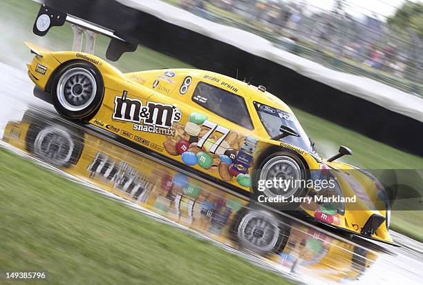 Jim Lowe and Paul Tracy drive the M&M's Snack Mix/Speedway during the Grand-Am Rolex Sports Car Series inaugural Brickyard Grand Prix at Indianapolis...