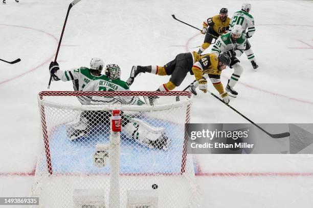 Ivan Barbashev of the Vegas Golden Knights scores a goal past Jake Oettinger of the Dallas Stars during the first period in Game Five of the Western...