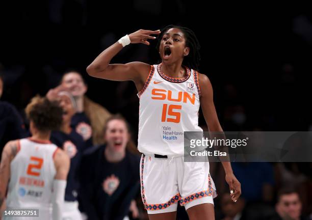 Tiffany Hayes of the Connecticut Sun celebrates her three point shot in the first half against the New York Liberty at Barclays Center on May 27,...