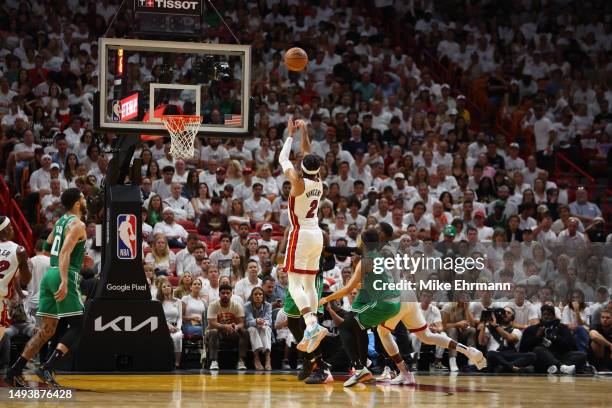 Gabe Vincent of the Miami Heat puts up a three point basket ahea dof Derrick White of the Boston Celtics during the second quarter in game six of the...