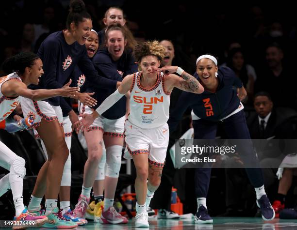Natisha Hiedeman of the Connecticut Sun celebrates her three point shot in the first half against the New York Liberty at Barclays Center on May 27,...