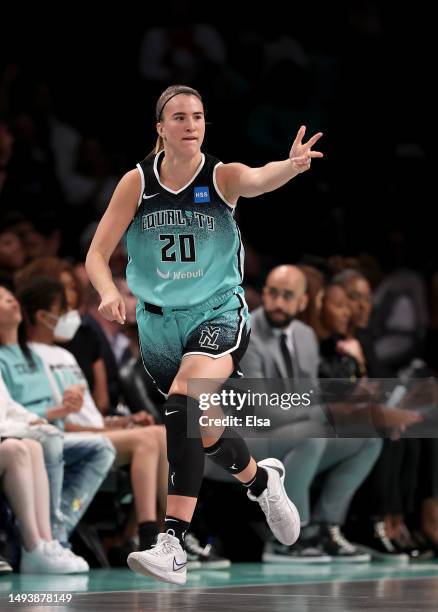 Sabrina Ionescu of the New York Liberty celebrates her three point shot in the second hal against the Connecticut Sun at Barclays Center on May 27,...