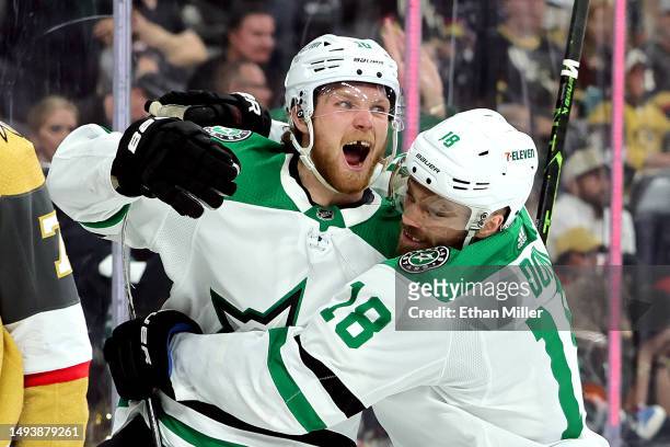 Ty Dellandrea of the Dallas Stars is congratulated by Max Domi after scoring a goal against the Vegas Golden Knights during the third period in Game...