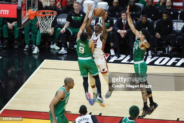 Jimmy Butler of the Miami Heat looks to pass over Derrick White of the Boston Celtics during the second quarter during the second quarter in game six...