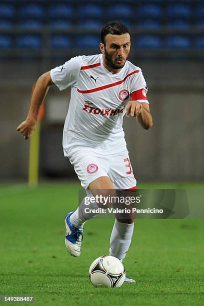 Vasilios Torosidis of Olympiacos in action during a pre-Season friendly match between Newcastle United and Olympiacos on July 27, 2012 in Faro,...