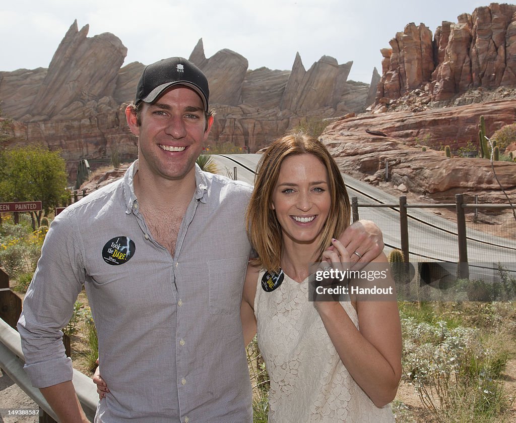 Actors John Krasinski and Emily Blunt Visit Disney's Cars Land