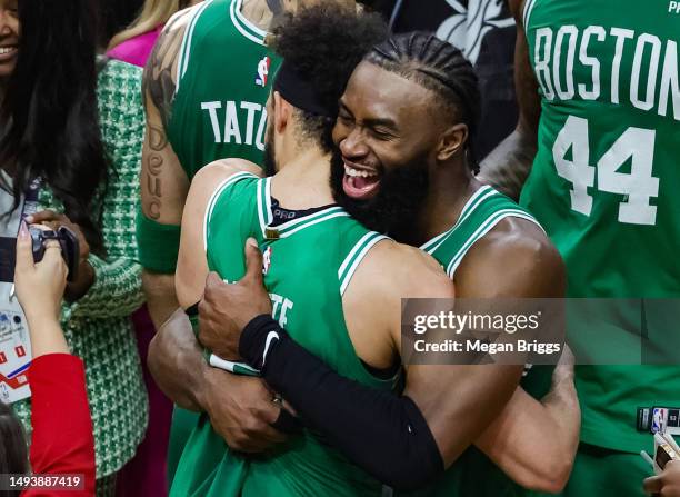 Derrick White and Jaylen Brown of the Boston Celtics react after defeating the Miami Heat 104-103 in game six of the Eastern Conference Finals at...