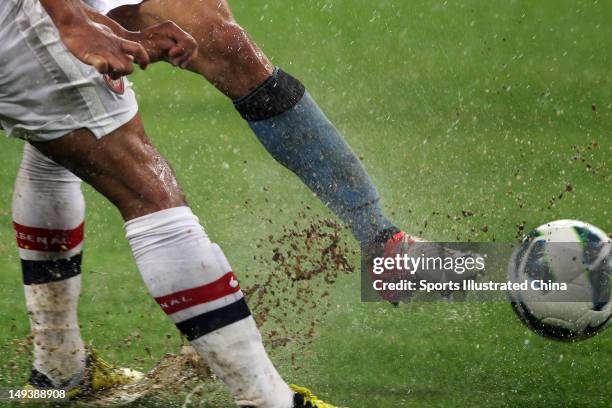 Close-up of players battling for the ball during the pre-season Asian Tour friendly match between Arsenal and Manchester City at Birds Nest Stadium...