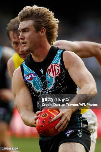 Jason Horne-Francis of the Power runs with the ball during the round 11 AFL match between Richmond Tigers and Yartapuulti / Port Adelaide Power at...