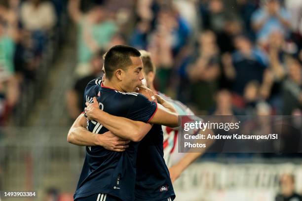 Bobby Wood of New England Revolution celebrates his goal with teammates during a game between Chicago Fire FC and New England Revolution at Gillette...