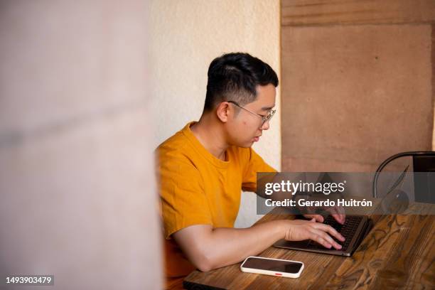 korean man working in latin america - foreign affairs stock pictures, royalty-free photos & images