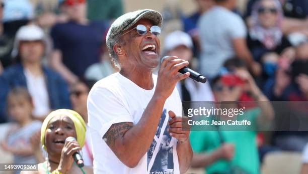 Yannick Noah performs his songs during a special concert on Central Court to celebrate the 40th anniversary of his victory at the French Open 1983...