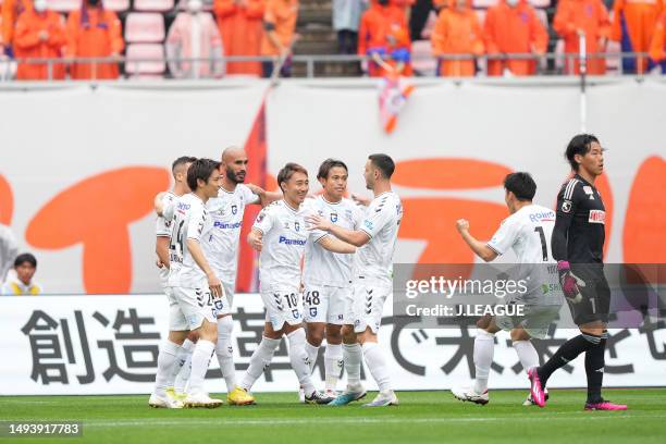 Shu KURATA of Gamba Osaka celebrates scoring his side's first goal with his team mates during the J.LEAGUE Meiji Yasuda J1 15th Sec. Match between...