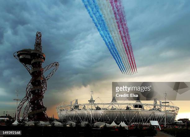The Red Arrows fly over Olympic Stadium during the Opening Ceremony for the 2012 Summer Olympic Games on July 27, 2012 at Olympic Park in London,...