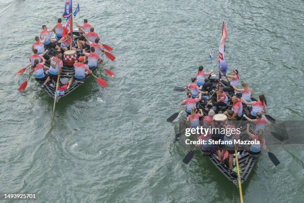 Boats cross the Grand Canal on the way to to the starting point on May 28, 2023 in Venice, Italy. 47th edition of the Vogalonga, the regatta will...