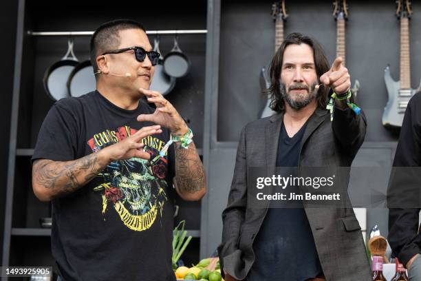 Chef Roy Choi and actor and bassist Keanu Reeves of Dogstar gesture on the Williams Sonoma stage during the 2023 BottleRock Napa Valley festival at...