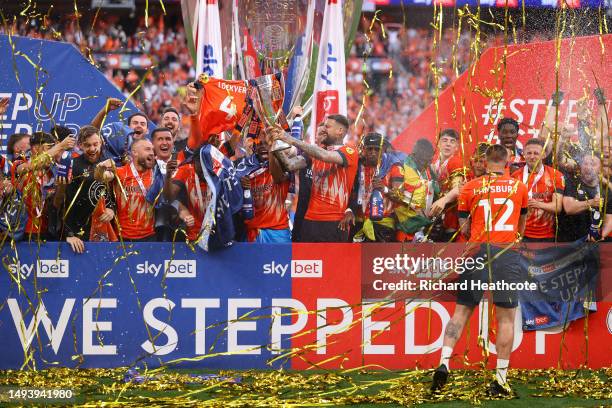 Luton Town celebrate after the team's victory and promotion to the Premier League in the Sky Bet Championship Play-Off Final between Coventry City...