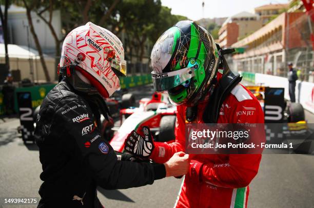 Race winner Frederik Vesti of Denmark and PREMA Racing and Second placed Theo Pourchaire of France and ART Grand Prix shake hands in parc ferme...