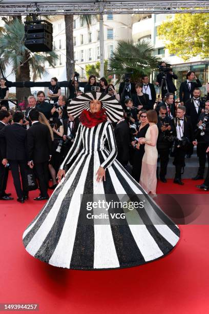 British model Ikram Abdi Omar attends the "Elemental" screening and closing ceremony red carpet during the 76th Cannes Film Festival at Palais des...