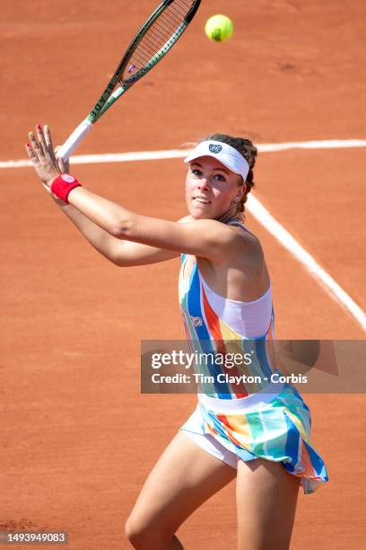 Magdalena Frech of Poland in action against Shuai Zhang of China in the first round of the singles competition on Court Seven during the 2023 French...