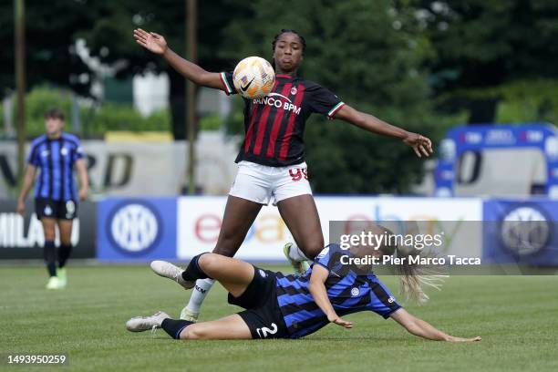 Chante Mary Dompig of AC Milan Women competes for the ball with Nja Sonstevold of FC Internazionale Women during the match between FC Internazionale...
