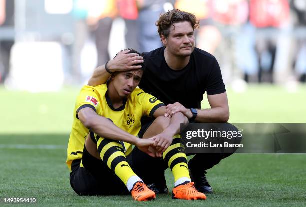 Jude Bellingham and Edin Terzic, Head Coach of Borussia Dortmund, look dejected following the team's draw, as they finish second in the Bundesliga...