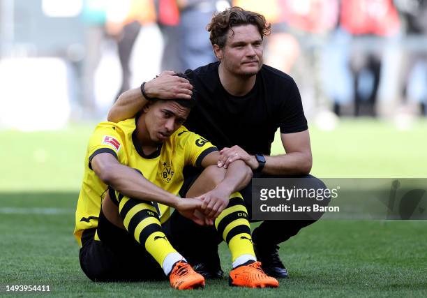 Jude Bellingham and Edin Terzic, Head Coach of Borussia Dortmund, look dejected following the team's draw, as they finish second in the Bundesliga...