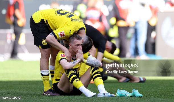 Marco Reus of Borussia Dortmund looks dejected following the team's draw, as they finish second in the Bundesliga behind FC Bayern Munich during the...