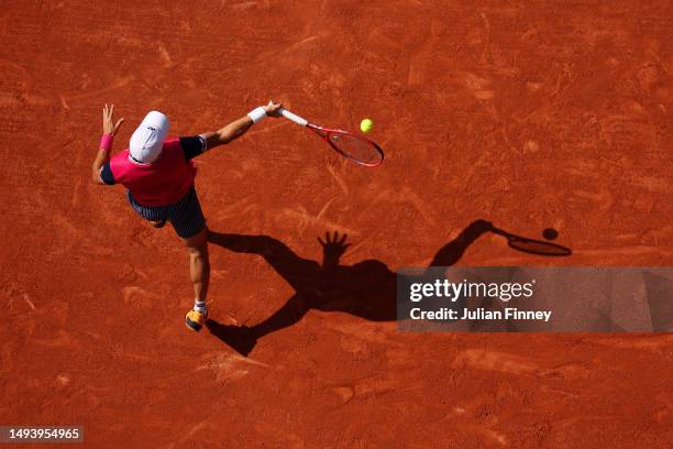 Radu Albot of Moldova plays a forehand against Patrick Kypson of United States during their Men's Singles First Round Match on Day One of the at...
