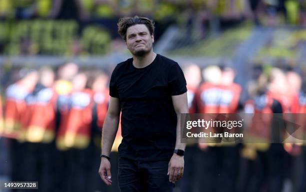 Edin Terzic, Head Coach of Borussia Dortmund, looks dejected following the team's draw, as they finish second in the Bundesliga behind FC Bayern...