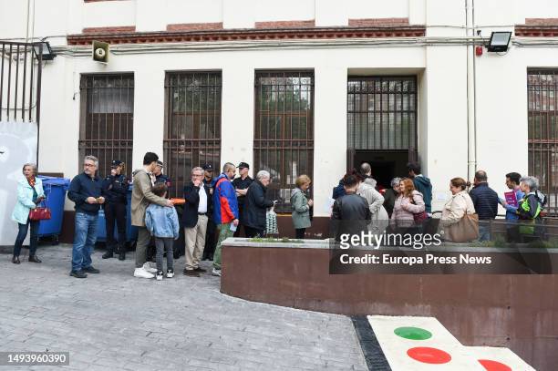 Several people arrive at the polling station CEIP Santa Maria, on 28 May, 2023 in Madrid, Community of Madrid, Spain. Today, 28M, municipal elections...