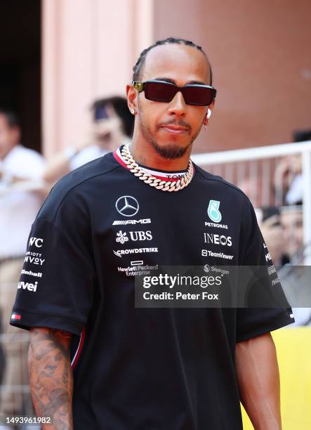 Lewis Hamilton of Great Britain and Mercedes looks on from the drivers parade prior to the F1 Grand Prix of Monaco at Circuit de Monaco on May 28,...