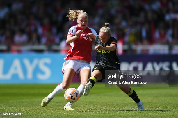 Frida Maanum of Arsenal battles for possession with Remi Allen of Aston Villa during the FA Women's Super League match between Arsenal and Aston...