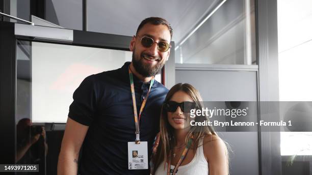 Gianluigi Donnarumma and Alessia Elefante pose for a photo in the Paddock during the F1 Grand Prix of Monaco at Circuit de Monaco on May 28, 2023 in...