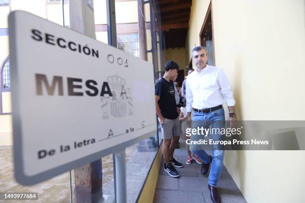 The candidate of the Popular Party for the Presidency of the Canary Islands, Manuel Dominguez, exercises his right to vote at a polling station on...