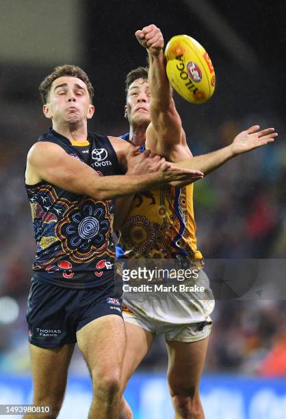 Lachlan Sholl of the Crows spoiled by Josh Dunkley of the Lions during the round 11 AFL match between Adelaide Crows and Brisbane Lions at Adelaide...