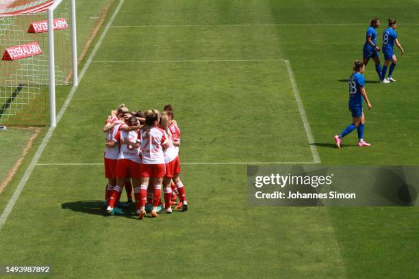 Saki Kumagai of FC Bayern Munich celebrates with team mates after scoring their sides first goal during the FLYERALARM Frauen-Bundesliga match...