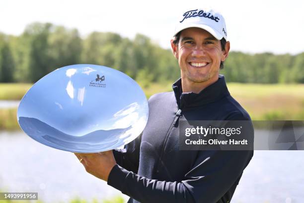 Matteo Manassero of Italy poses with the trophy after winning the tournament following the final round of the Copenhagen Challenge presented by Ejner...
