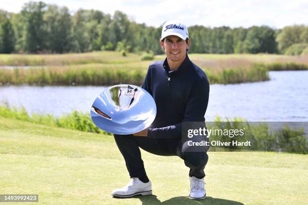 Matteo Manassero of Italy poses with the trophy after winning the tournament following the final round of the Copenhagen Challenge presented by Ejner...